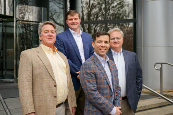 David, Carter, Michael, Jeff - Yates employees outside of the office building.